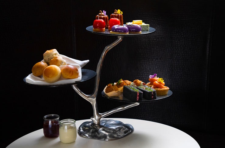 High tea set out on a sculptural cake stand